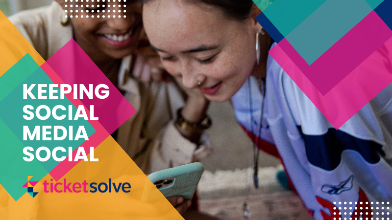 Keeping social media social cover picture with Ticketsolve branding designs in the top right and bottom left corner. The centre image is of two women looking at the screen of a phone and smiling. 